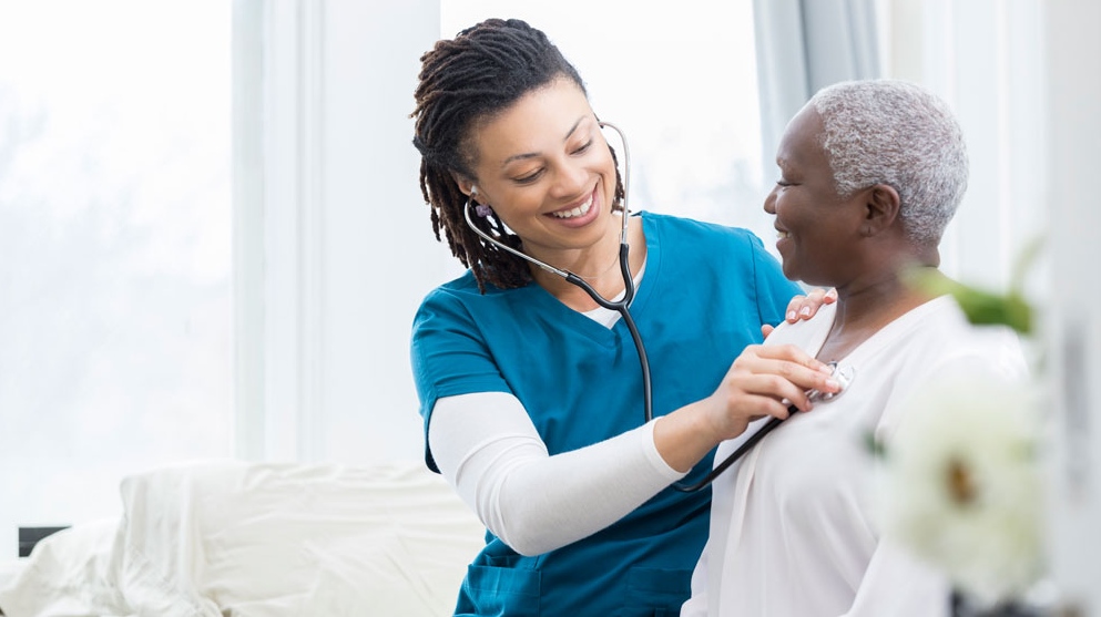 A nurse is seen using her stethoscope on a senior in this undated stock image. (iStock)