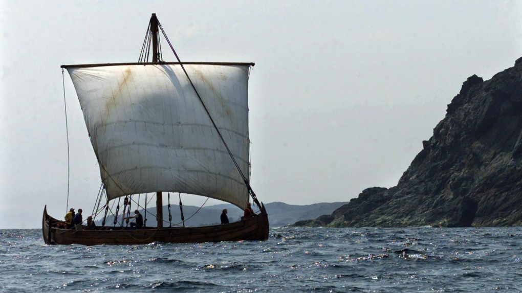 The replica Viking boat Snorri, built in Maine, heads past an island near L'Anse aux Meadows, N.L., in July 2000. The vessel was part of a flotilla that will travelled to the historic site with the Islendingur, a Viking longship, honouring Lief Ericson's voyages around the year 1000 AD.(CP PHOTO/Andrew Vaughan) 