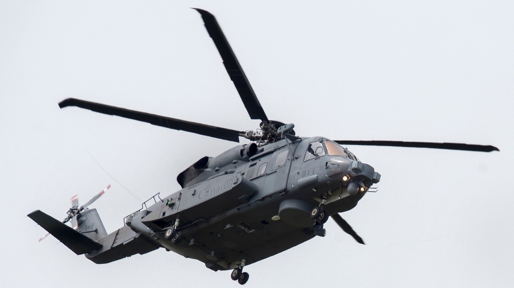A CH-148 Cyclone helicopter from 12 Wing Shearwater, home of 423 Maritime Helicopter Squadron, flies near the base in Eastern Passage, N.S. on Tuesday, June 23, 2020. (THE CANADIAN PRESS/Andrew Vaughan)