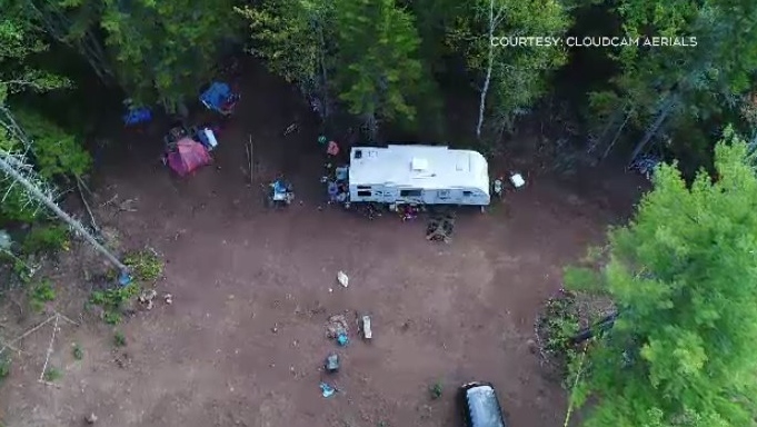 Drone footage from the scene in Millvale, N.S. offers little insight, with no obvious damage to the newer model travel trailer, children's bikes and other items outside. (Photo courtesy: CloudCam Aerials)