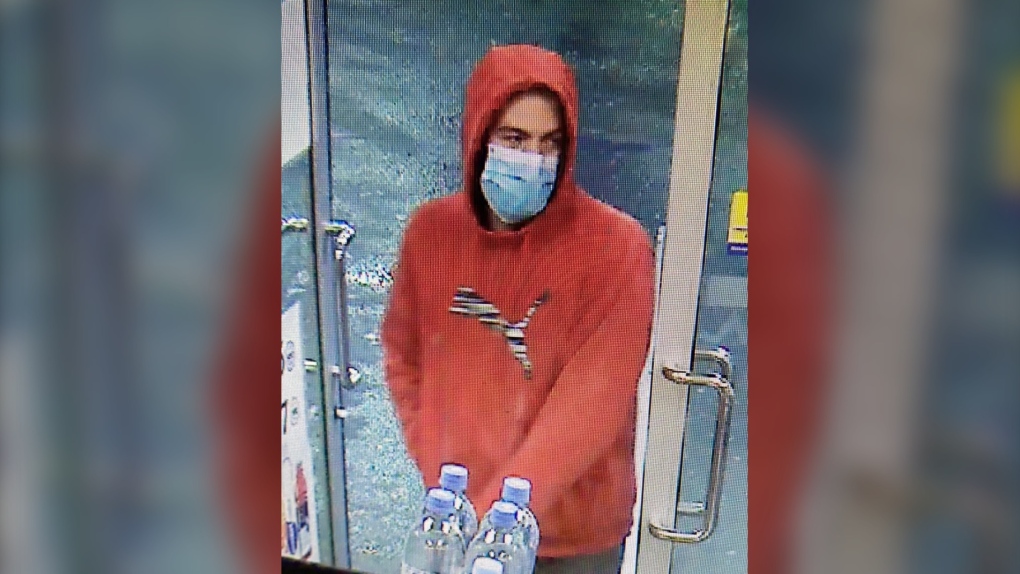 The man is described as white, with brown hair. He was wearing grey sweatpants, a red Puma hoodie, beige work boots and a surgical mask worn inside-out. (SOURCE: RCMP)