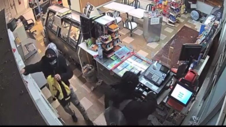 Police say two suspects were captured on surveillance video.  One person is described as wearing a dark green shirt, grey pants and a black hat.  The second suspect is described as wearing all black clothing.  Both suspects were carrying backpacks. (Courtesy: N.S. RCMP)