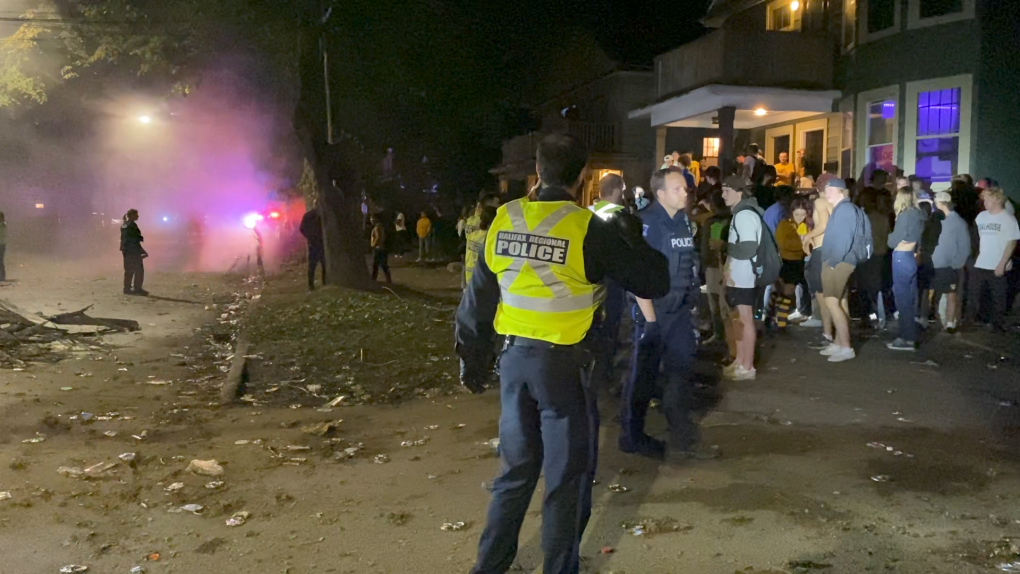 Police disperse a large crowd of people partying on a street in Halifax. (Jesse Thomas/CTV)