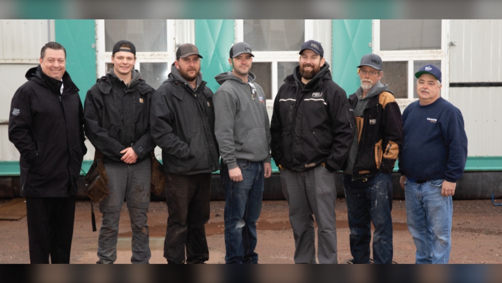 Matthew MacKay, minister of social development and housing with staff from Leading Edge Group, Karve Builders and Hansen Electric outside of Park Street Emergency Shelter (Source: P.E.I. government) 