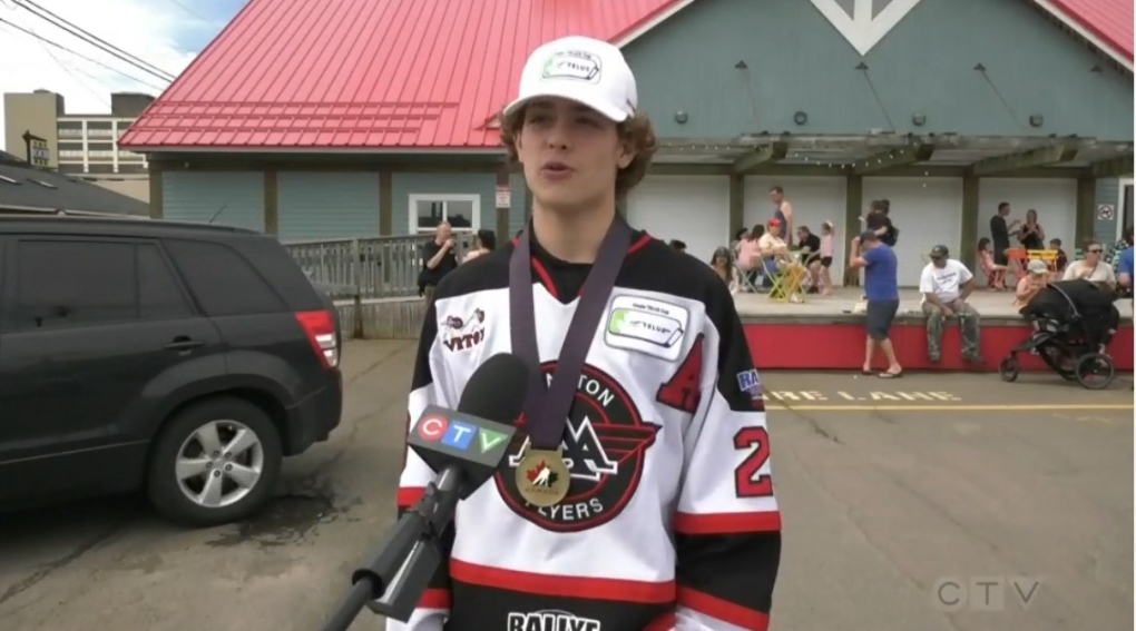 N.B. Hockey Team Shows Off Championship Hardware