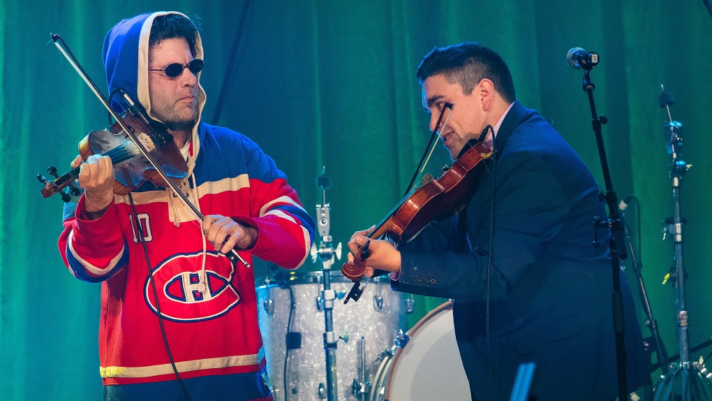 Indigenous Artist of the Year Morgan Toney and Ashley MacIsaac perform together during the East Coast Music Awards in Fredericton on Thursday May 5, 2022. (THE CANADIAN PRESS/Kelly Clark)
