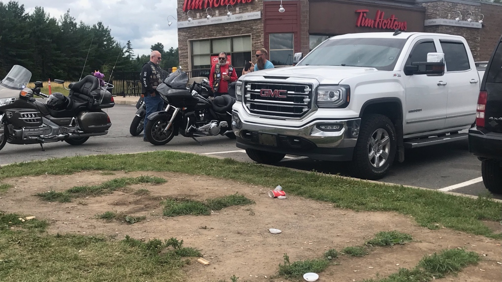 Two people were injured and taken to hospital after an SUV crashed into a picnic table outside this Tim Hortons in Oromocto, N.B., on Aug. 11, 2022. (Laura Brown/CTV Atlantic)
