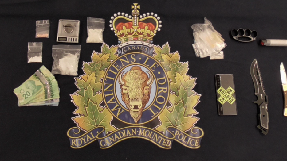 Police have arrested a Moncton woman and seized drugs and weapons in connection to an ongoing drug trafficking investigation. (Courtesy: NB RCMP)