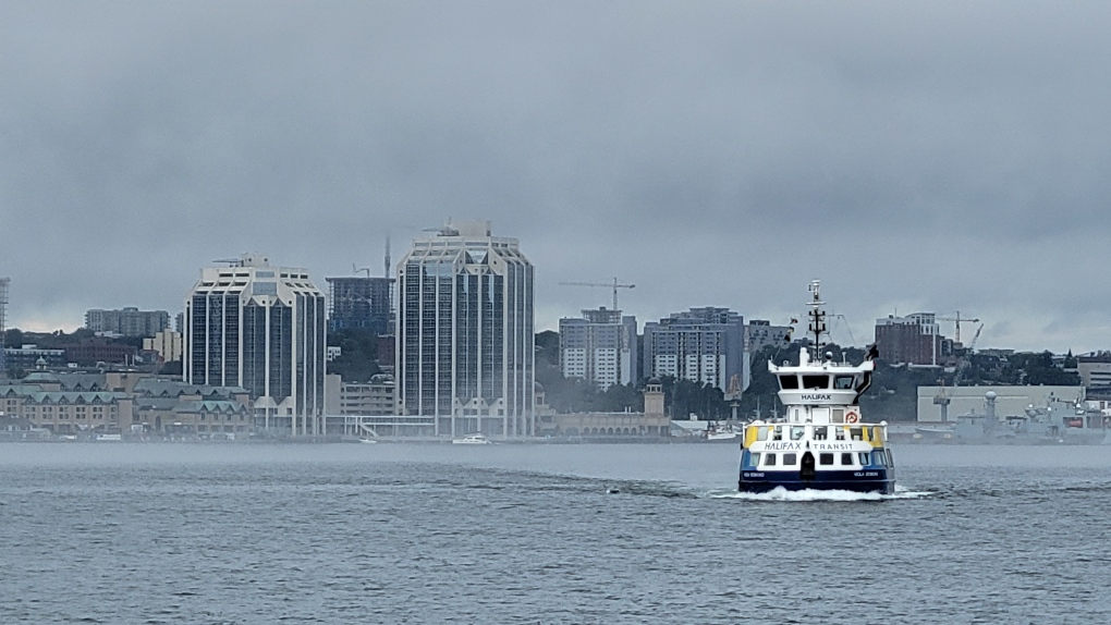 A passenger ferry, operated by Halifax Transit, makes its way across the Halifax harbour to the Woodside ferry terminal in Dartmouth, N.S., on Tuesday, Aug. 2, 2022. THE CANADIAN PRESS/Doug Ives
