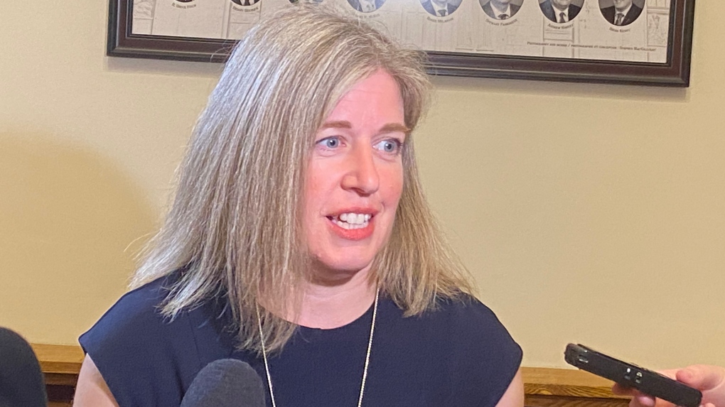 New Brunswick Liberal Leader Susan Holt talks to reporters at the legislature in Fredericton, N.B., on June 13, 2023. (THE CANADIAN PRESS/Hina Alam)