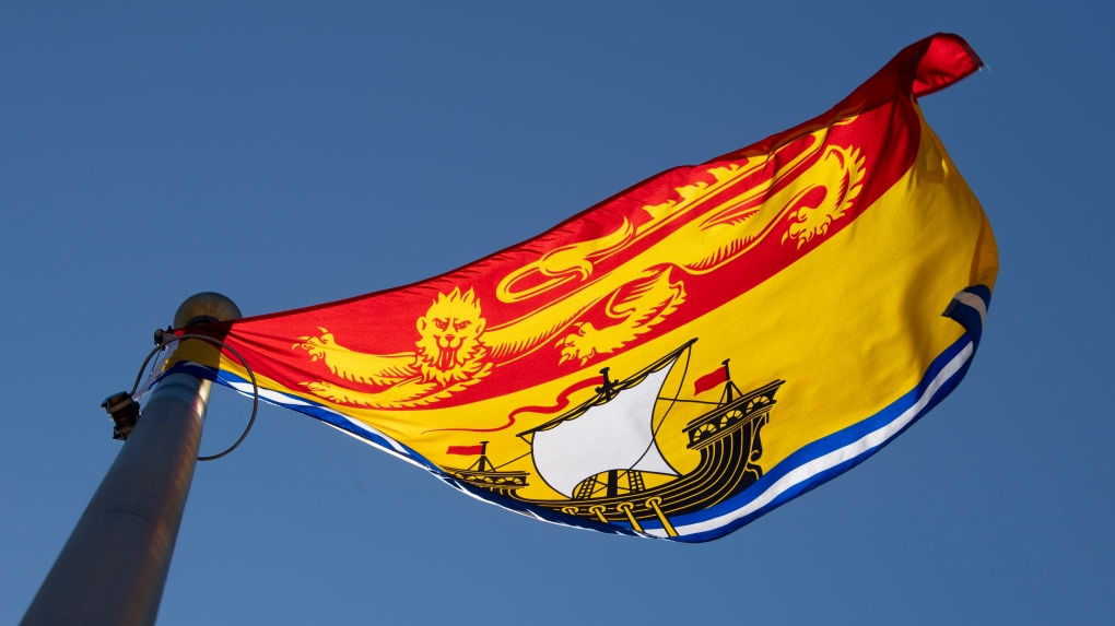 New Brunswick's provincial flag flies in Ottawa on Monday July 6, 2020. THE CANADIAN PRESS/Adrian Wyld