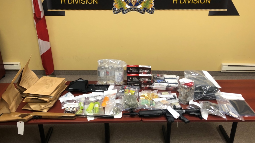 The Nova Scotia RCMP says it seized cocaine, evidence of child pornography, electronic devices, counterfeit bills, and firearms from a residence in Yarmouth. (RCMP)