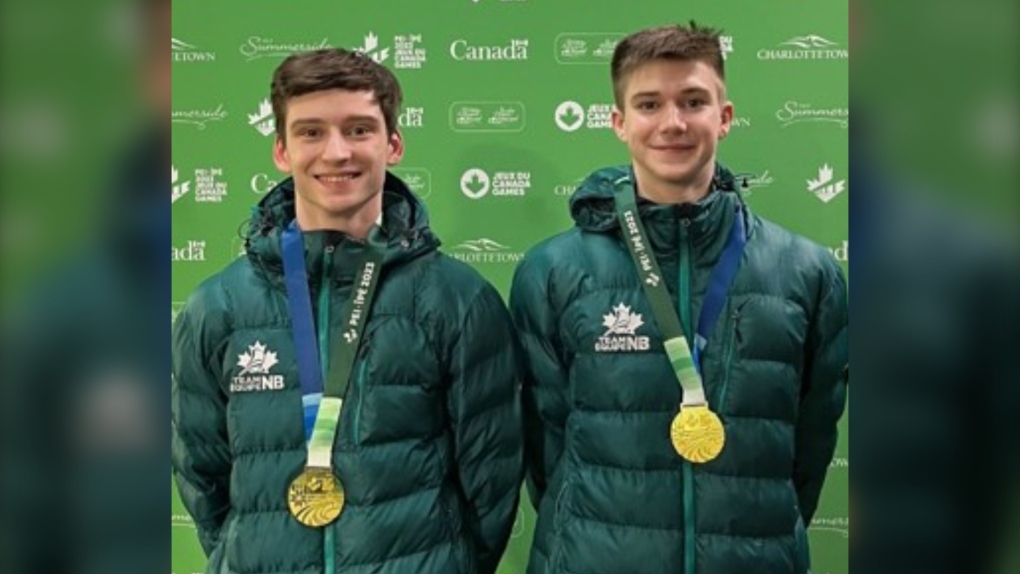 Fredericton's Dexter Richard and Eric Davis struck gold in the men's synchro trampoline on Monday – claiming the first medal of the games for Team New Brunswick. (New Brunswick Government)