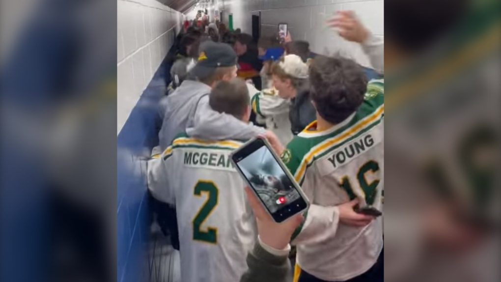 Hockey players are seen belting out Neil Diamond's "Sweet Caroline" during a tournament in Cape Breton on Feb. 4, 2023. (Red Cup 43/Facebook)