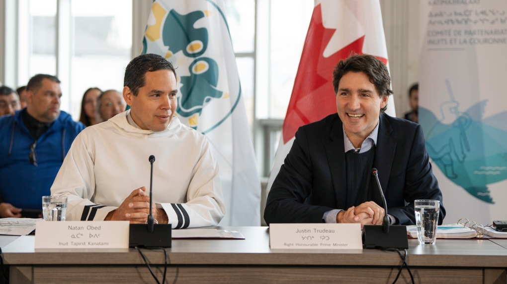 Prime Minister Justin Trudeau, right, and Natan Obed, president of the Inuit Tapiriit Kanatami, make opening remarks during a meeting of the Inuit-Crown Partnership Committee (ICPC) at the Illusuak Cultural Centre in Nain, N.L. on Friday, May 12, 2023. THE CANADIAN PRESS/Darren Calabrese