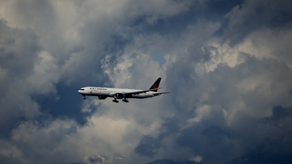 Air Canada says it has repaid about $589 million in debt that it used to buy aircraft. An Air Canada Boeing 777 is seen on approach to land at Vancouver International Airport in Richmond, B.C., on Tuesday, April 11, 2023. THE CANADIAN PRESS/Darryl Dyck